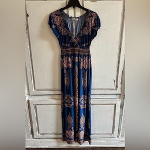 092: beautiful size medium maxi, dress, stretchy fabric in great condition